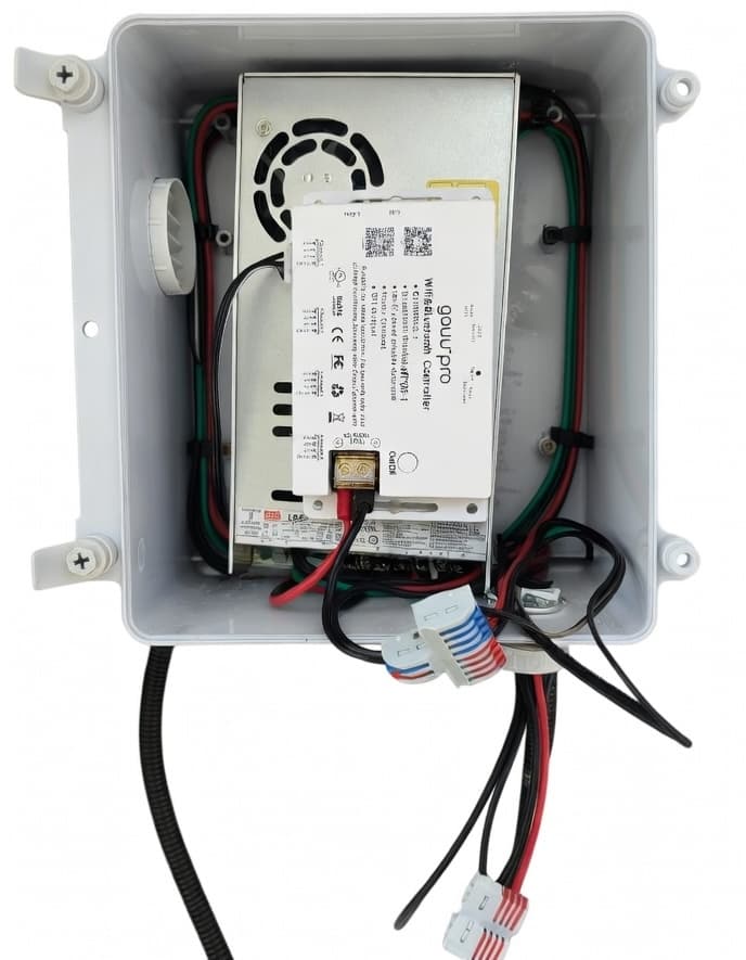 Uncertified control box with loose wiring, no fuse protection, and exposed connections