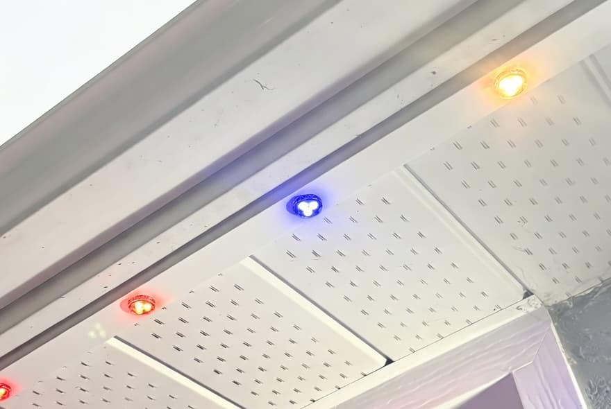 Nellow fascia installation showing soffit-mounted Hat Track with colour-matched LED nodes